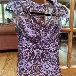Ellie Tahari sheer V neck blouse.